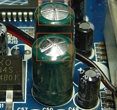 Swollen capacitors on the motherboard